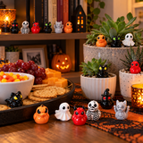 Mini Halloween ducks used on a bookshelf, party table and next to indoor plants