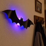 Close-up of one Midnight Swarm 3D bat light on a typical painted wall